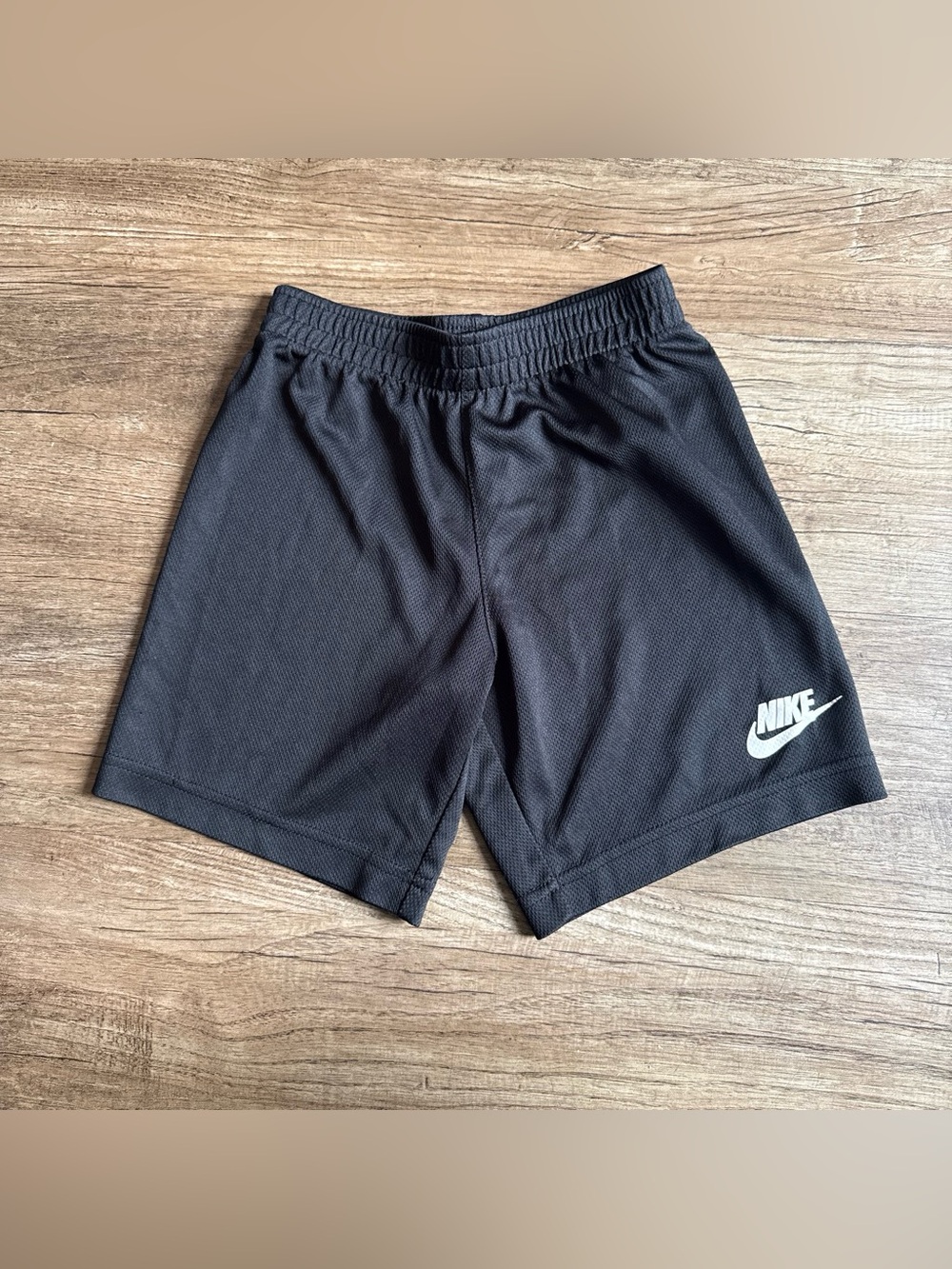 Nike Black Mesh Athletic Shorts with White Swoosh